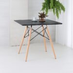 ترابيزة سفرة قرص MDF بطبقة ميلامين بأرجل خشب زان وشاسيه حديد  (ابيض -اسود )